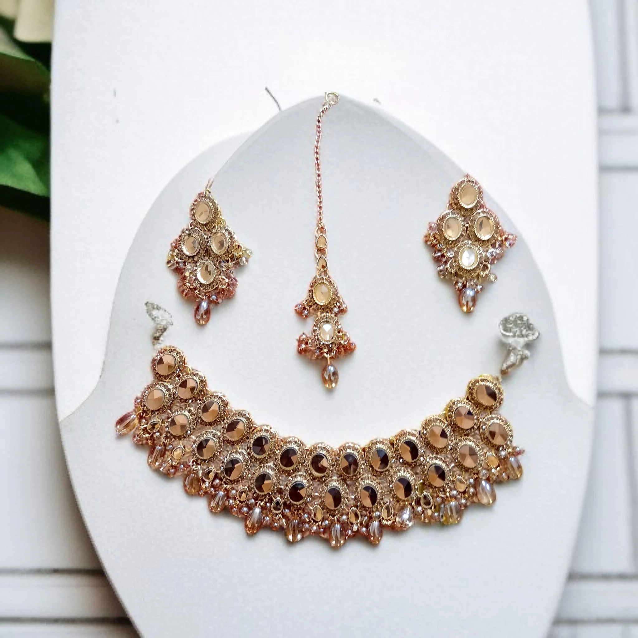 Buy Golden colour jewellery set with necklace , earrings and tikka at best price in pakistan